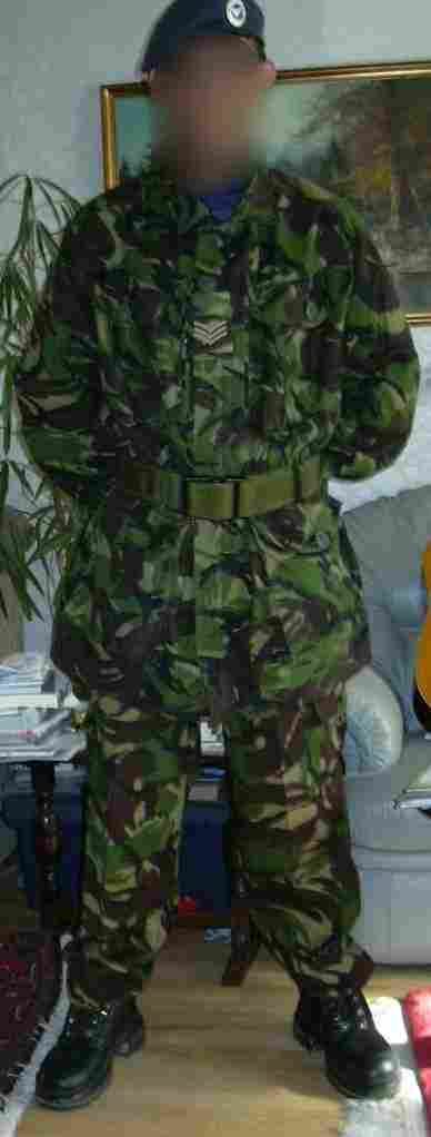 A cadet sergeant wearing Soldier 95 pattern trousers and field jacket